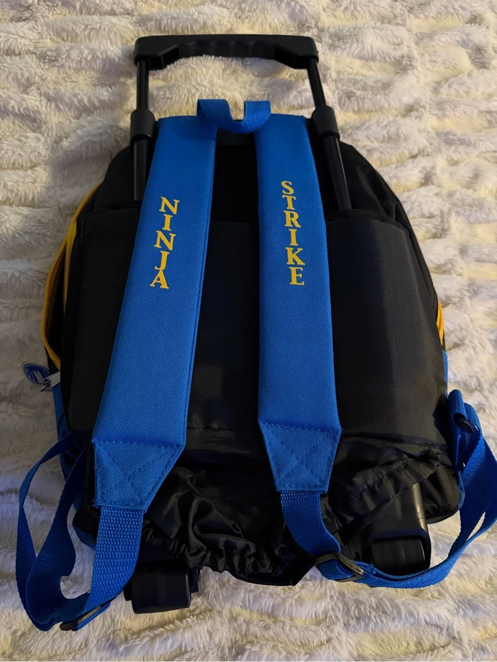 Power Ranger Blue and Yellow Rolling Backpack with power Ranger Graphic